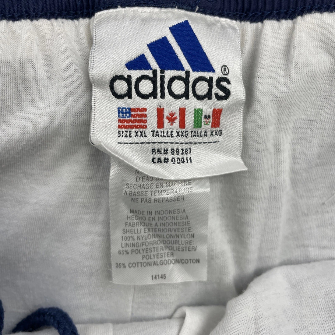 Vintage Adidas Nylon Track Pants Size 2XL Blue Striped
