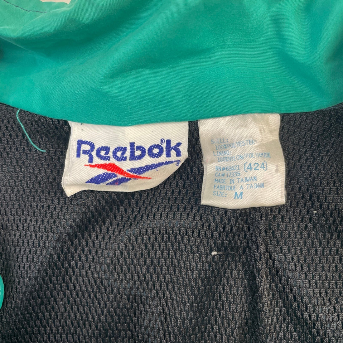 Vintage Reebok Windbreaker Light Jacket Size Medium Tonal