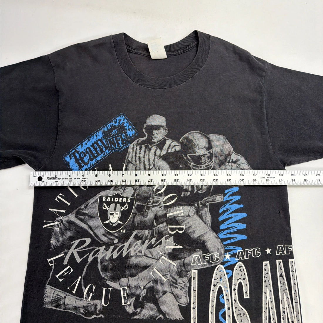 Vintage Los Angeles Raiders T-Shirt Size Large Wrap Around 90s NFL