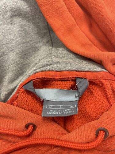 Nike swoosh sale jacket orange